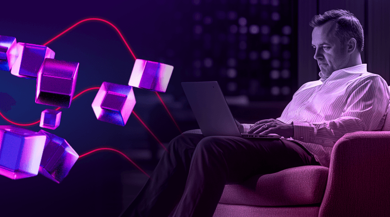 Man working on laptop with floating data cubes for financial services analytics visualization